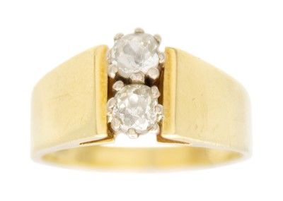 Lot 144 - An 18ct hallmarked gold, mine cut diamond set two stone ring.