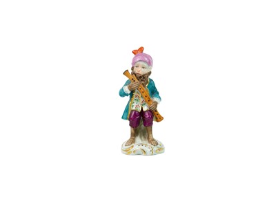 Lot 351 - A German porcelain twelve-piece monkey band.