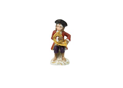 Lot 351 - A German porcelain twelve-piece monkey band.