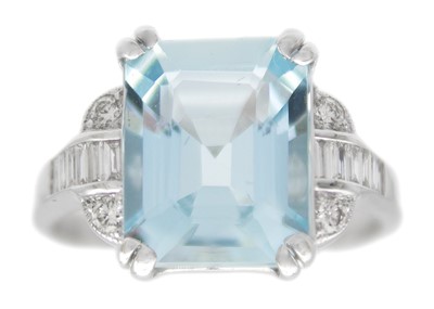 Lot 158 - An 18ct white gold aquamarine and diamond set dress ring.