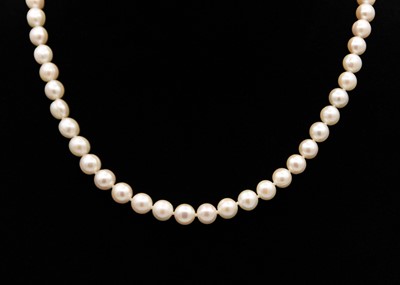 Lot 159 - A cultured pearl necklace with 9ct ball clasp.