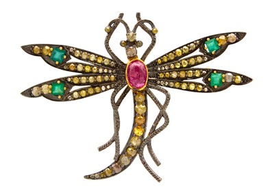 Lot 163 - A large silver gilt dragonfly brooch set with a ruby, emeralds and yellow diamonds.