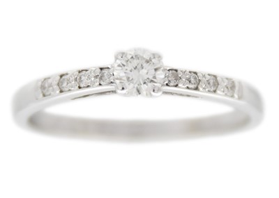 Lot 179 - An 18ct white gold diamond solitaire ring.