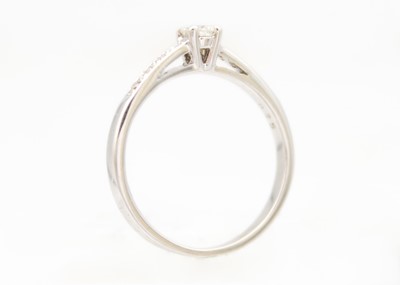 Lot 179 - An 18ct white gold diamond solitaire ring.