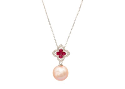 Lot 180 - An 18ct white gold diamond and ruby set pendant suspended with a pink cultured pearl.