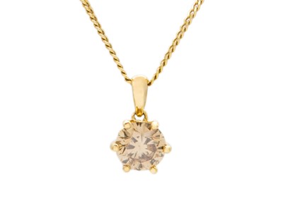 Lot 185 - An 18ct gold 1.00ct fancy light brown diamond solitaire pendant.