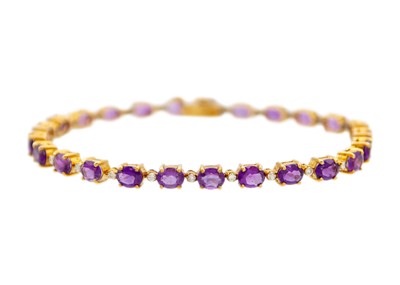 Lot 191 - A 9ct amethyst and diamond set bracelet.