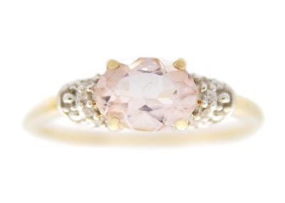 Lot 203 - A 9ct oval cut morganite and diamond set ring by Gemporia.