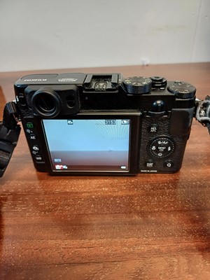 Lot 55 - A Fujifilm X20 digital camera.