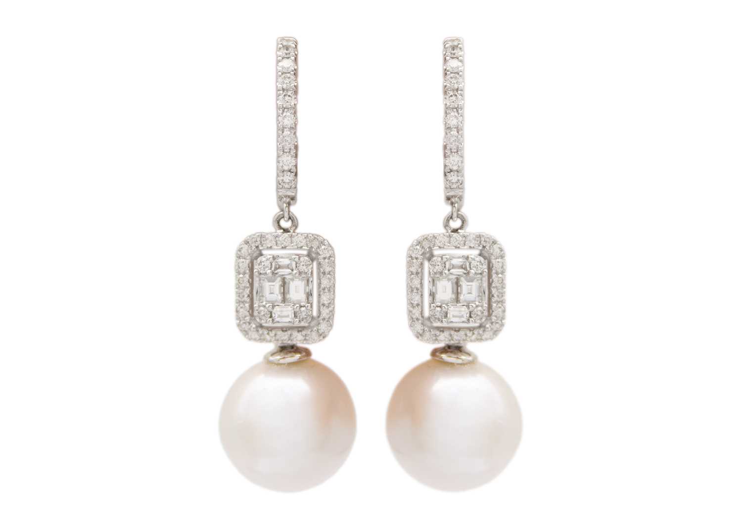 Lot 214 - An attractive pair of grey cultured and pearl and diamond set 18ct white gold pendant earrings.