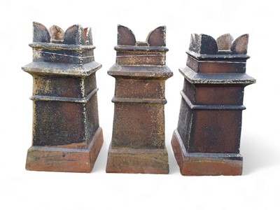 Lot 352 - Three matching crown top salt glaze chimney pots.