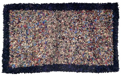 Lot 268 - A 'clippy' rag rug.