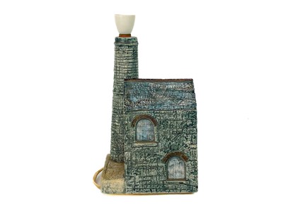 Lot 350 - A Troika pottery engine house table lamp.
