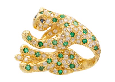 Lot 92 - An 18ct mid-20th century pave set diamond emerald and sapphire leopard design brooch.