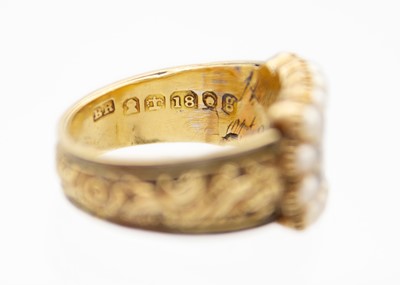 Lot 204 - A George IV 18ct hallmarked gold and black enamel seed pearl set memorial ring.