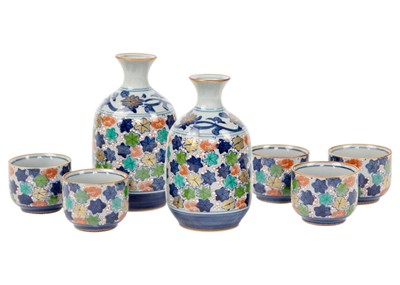 Lot 197 - A Japanese saki set, 20th century.