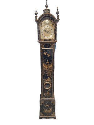 Lot 592 - A black lacquered small longcase clock.