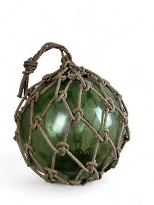 Lot 1184 - A huge blown green glass float