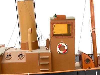 Lot 91 - A well made kit built radio controlled model of a steam tug boat.