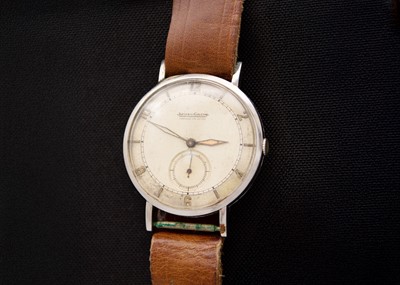 Lot 127 - JAEGER-LECOULTRE - A 1940's stainless steel pie-pan dial gentleman's wristwatch.