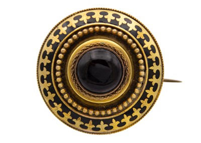 Lot 166 - A Victorian gold and black enamel Etruscan Revival memorial brooch set with banded agate.