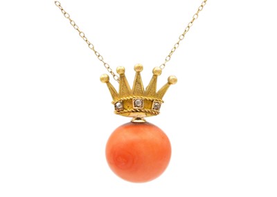 Lot 217 - A 19th-century 15ct gold diamond set coronet design coral pendant.