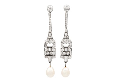 Lot 201 - A good pair of Art Deco platinum and diamond set pendant earrings with pearl drops.