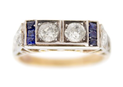 Lot 212 - An Art Deco 9ct rose and white gold diamond and sapphire set ring.