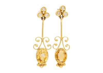 Lot 219 - A pair of 18ct diamond and citrine pendant earrings.