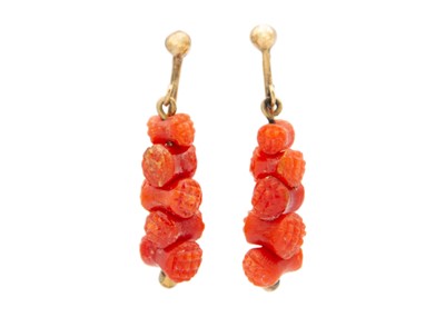 Lot 213 - A pair of 9ct stick coral set pendant screw back earrings.