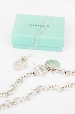 Lot 327 - TIFFANY & CO - A sterling silver T-bar necklace and a pendant necklace.