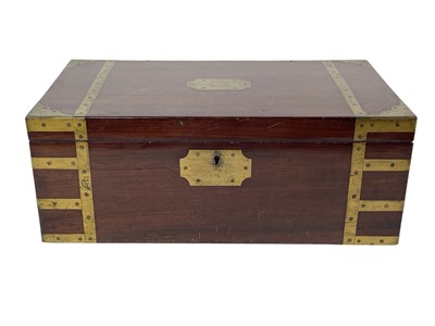 Lot 147 - A late George III mahogany and brass bound campaign writing slope.