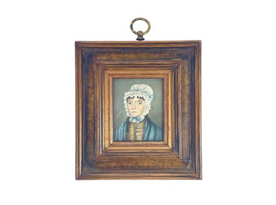 Lot 36 - A miniature portrait of a lady wearing a lace bonnet.