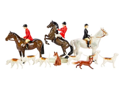 Lot 591 - A Beswick Huntsman on a rearing horse.
