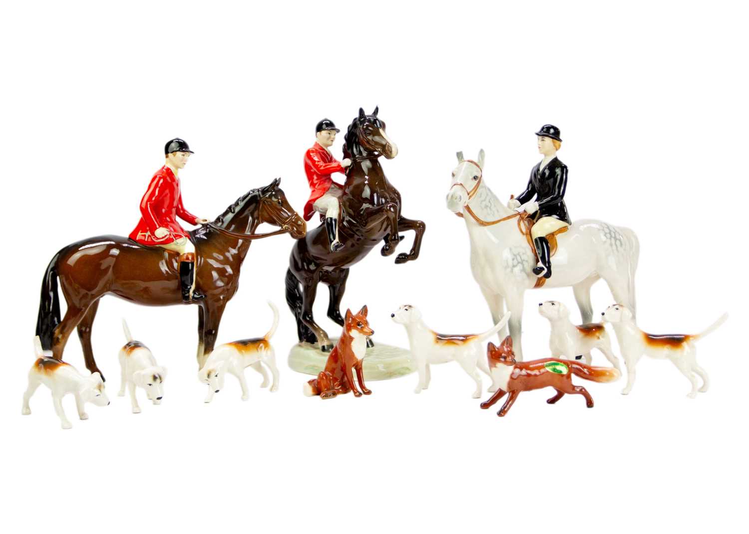 Lot 591 - A Beswick Huntsman on a rearing horse.