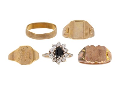 Lot 51 - A selection of four 9ct hallmarked gold rings and a 9ct and silver cluster ring.