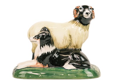 Lot 595 - A Moorcroft Pottery Swaledale figure group.