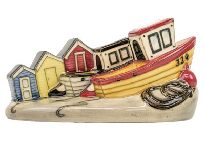 Lot 596 - A Moorcroft pottery model Memories of the Seaside.