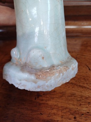 Lot 705 - Six Chinese celadon glazed pottery figures, probably Yuan Dynasty.