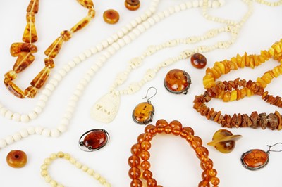 Lot 288 - A collection of amber and bone bead necklaces.