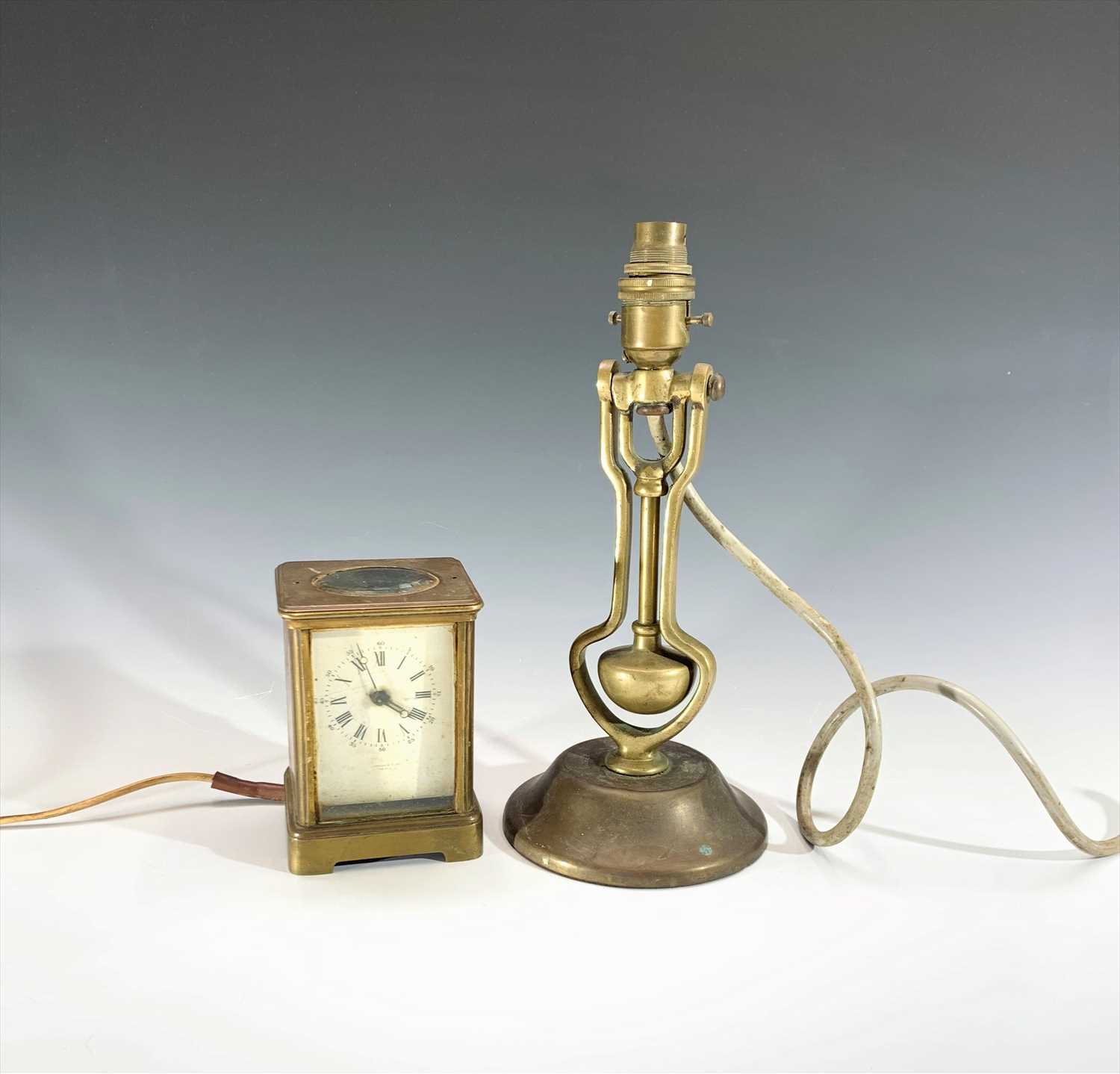 Lot 271 - A ship's brass gimbal lamp, fitted for...