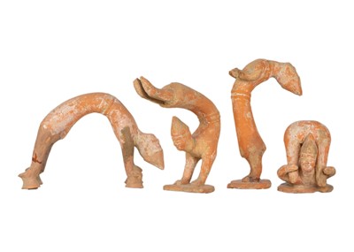 Lot 216 - Four Chinese terracotta models of arcrobats, possibly Han Dynasty.