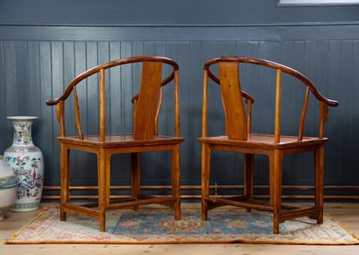 Lot 172 - A pair of Chinese huanghuali horseshoe armchairs, quanyi.