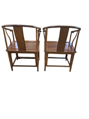 Lot 172 - A pair of Chinese huanghuali horseshoe armchairs, quanyi.