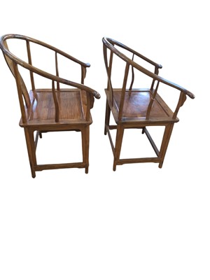 Lot 172 - A pair of Chinese huanghuali horseshoe armchairs, quanyi.
