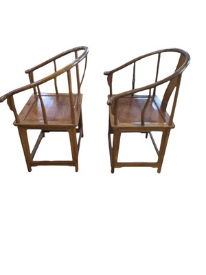 Lot 172 - A pair of Chinese huanghuali horseshoe armchairs, quanyi.