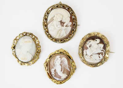 Lot 261 - A collection of four Victorian shell cameo brooches with pinchbeck mounts.