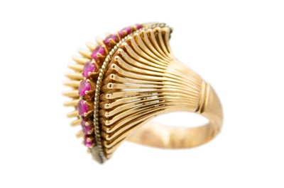 Lot 146 - A heavy 18ct rose gold (tested) ruby set 1950's dress ring.