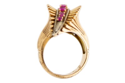 Lot 146 - A heavy 18ct rose gold (tested) ruby set 1950's dress ring.