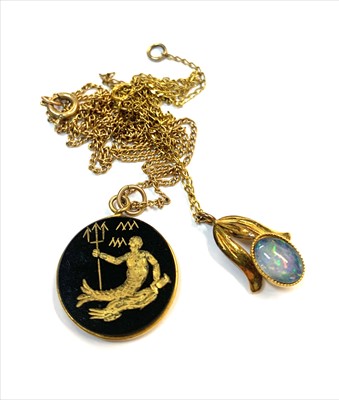 Lot 2486 - An opal set pendant on gold chain and one...